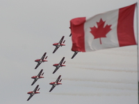 canadian forces snowbirds with canadian flag 