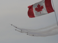 canadian forces snowbirds and canadian flag 