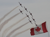 canadian forces snowbirds and canadian flag 